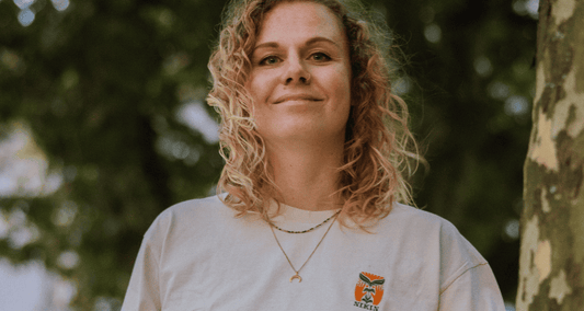 Illustrator Janina wears her specially designed NIKIN shirt.